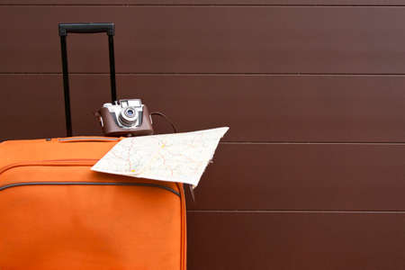 suitcase with camera and mapの写真素材