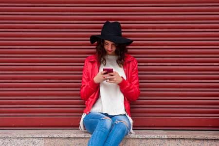 young woman with mobile phoneの写真素材