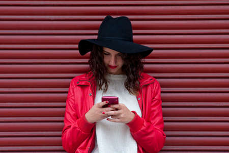 young woman with mobile phoneの写真素材