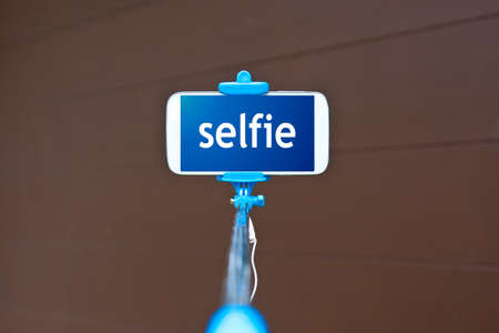 selfie stick with mobile phoneの写真素材