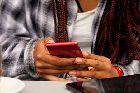 hands with mobile telefnoの写真素材