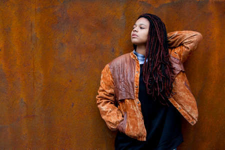 woman urban fashion on the wallの写真素材