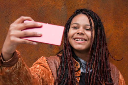 selfie with mobile phoneの写真素材