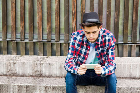 young man with mobile phone