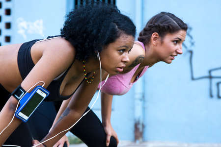 girls in position to runの写真素材