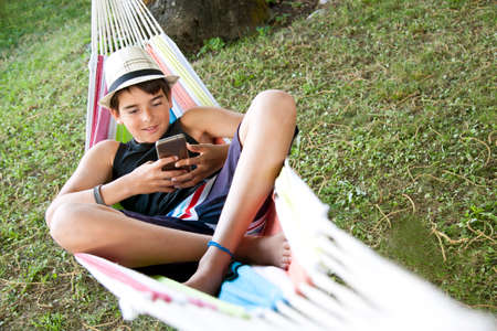 mobile child in the hammockの写真素材