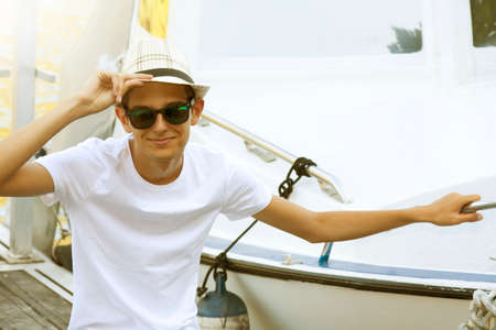 young man on the boatの写真素材