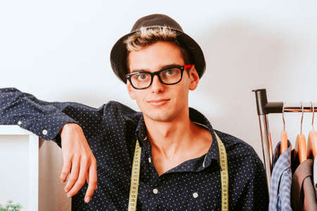 creative young man in fashion workshopの写真素材