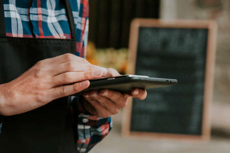 hand with mobile phone, shopping and storesの写真素材
