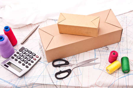 packages in cardboard boxes on the table for distribution