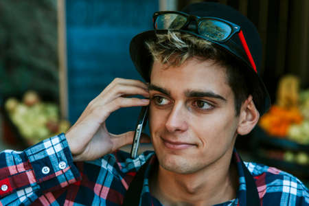 portrait of businessman talking on the phoneの写真素材