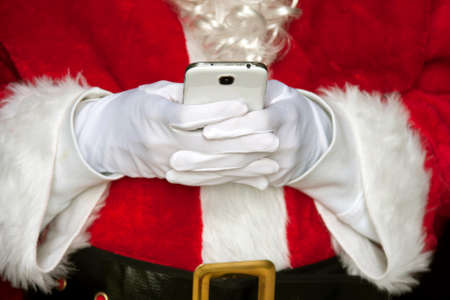 santa claus with the mobile phoneの写真素材