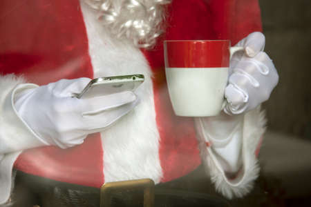 santa claus with the mobile phoneの写真素材
