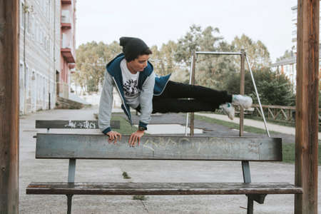 young people practicing parkour in the cityの写真素材