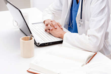 doctor with laptop in the office