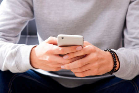 hands wtih mobile phone