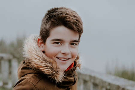 portrait of a boy sheltered in winterの写真素材