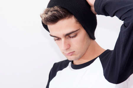 portrait of male young's style casual on wall whiteの写真素材