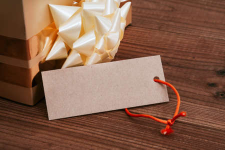 box of gift with label on wood oldの写真素材