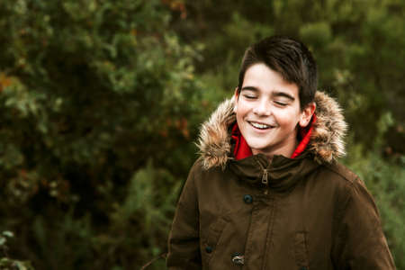 child with the mobile outdoor shootingの写真素材