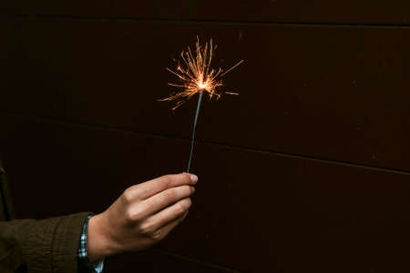 hand with the burning bengal