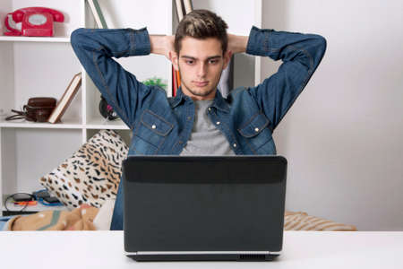 male young with the computer laptop resting