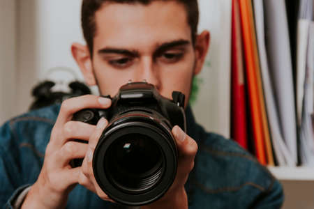 photographer with the camera's photos in the room of houseの写真素材
