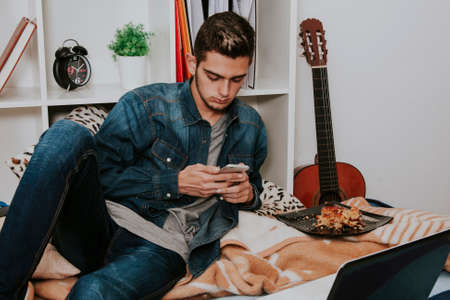 young attractive of style casual with the telephone phone in the roomの写真素材