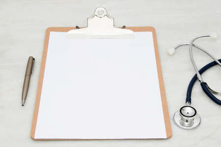 medical folder blank on your desktop with the stethoscope, top viewの写真素材