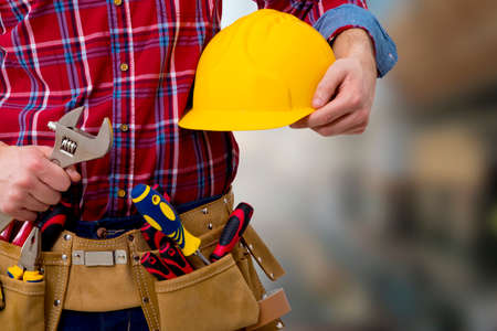the construction worker and technician on backgroundの写真素材