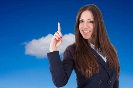 young business woman with the hand pointing and smilingの写真素材