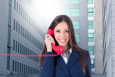 portrait of woman in business with the phone