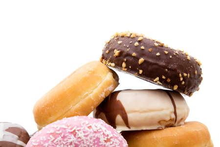 donuts stacked isolated in background whiteの写真素材