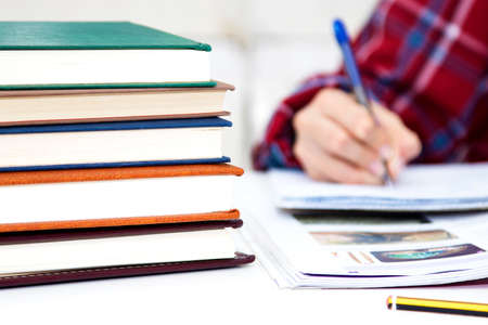 closeup of the hand of the student writing