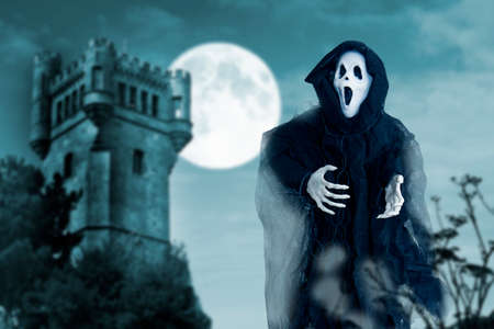 ghost of death on a mysterious background of halloweenの写真素材