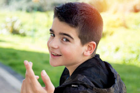 young boy portrait outdoors