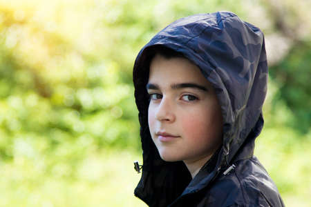 young boy portrait outdoorsの写真素材