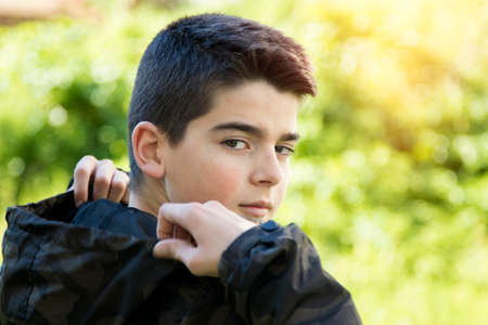 young boy portrait outdoorsの写真素材