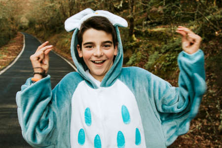 portrait of a boy disguised as having fun outdoor