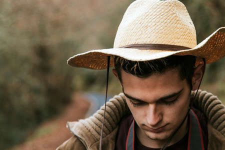 young man of style hipster with hatの写真素材