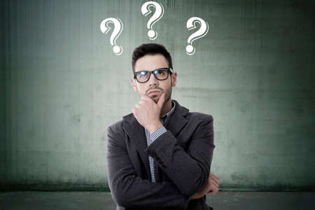 thoughtful man with questions