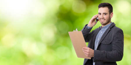 businessman talking on mobile phoneの写真素材