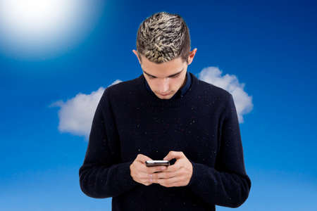 man young teen with the phone mobileの写真素材