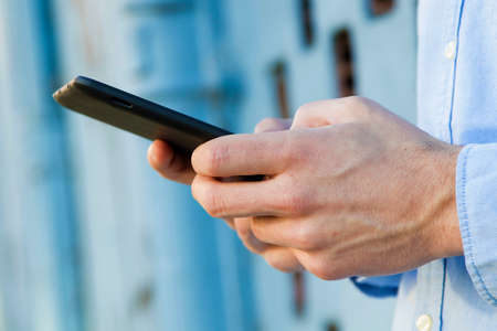 hands with the digital tablet outdoor, closeupの写真素材