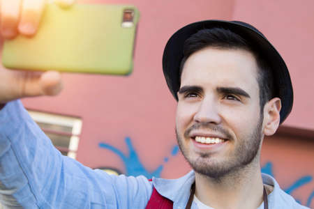 traveler and tourists on the street of the city with the cameraの写真素材
