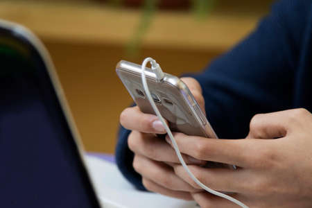 child with the phone in your hands