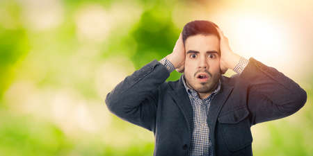 young business man with expression of surprise