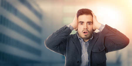 young business man with expression of surpriseの写真素材