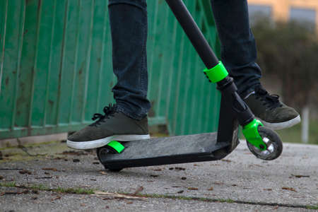 foot of the young man in skateboarding