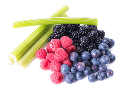 healthy vegan food, celery, blueberries, blackberries and raspberriesの写真素材